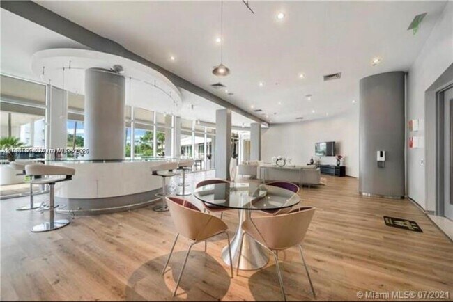 Building Photo - 10275 Collins Ave