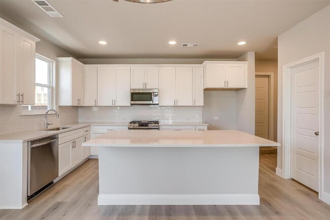 Building Photo - Coming Soon! Beautiful Townhome in Gated Community