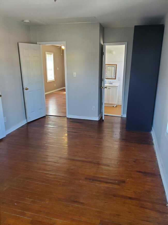 Bedroom View to bath and main living space - 1665 Neely Ave