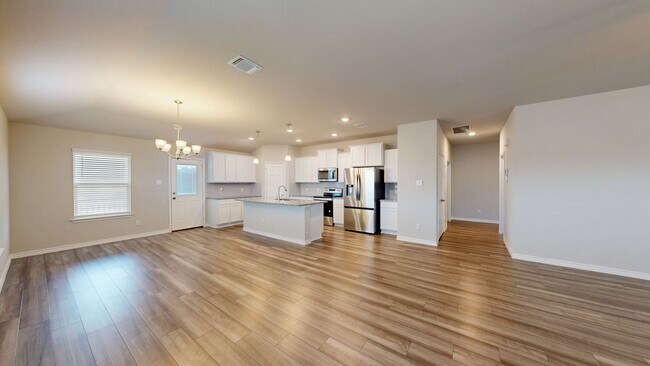 Building Photo - Discover this spacious 4-bedroom, 2-bath home with 3 CAR GARAGE!!!