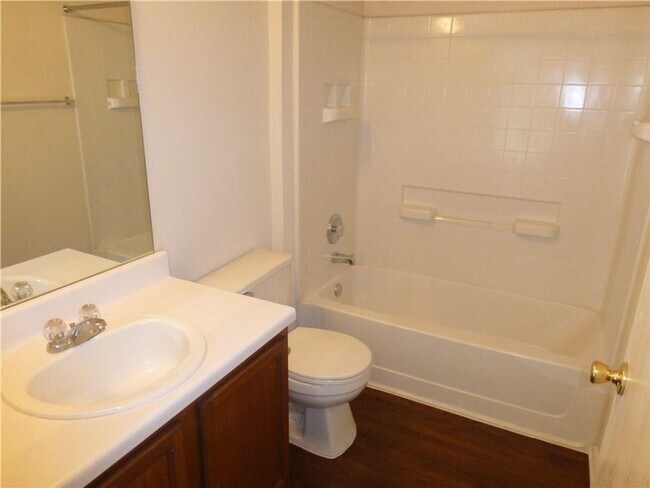 Building Photo - Generous Four Bedroom, Three Bath Home with Large Yard