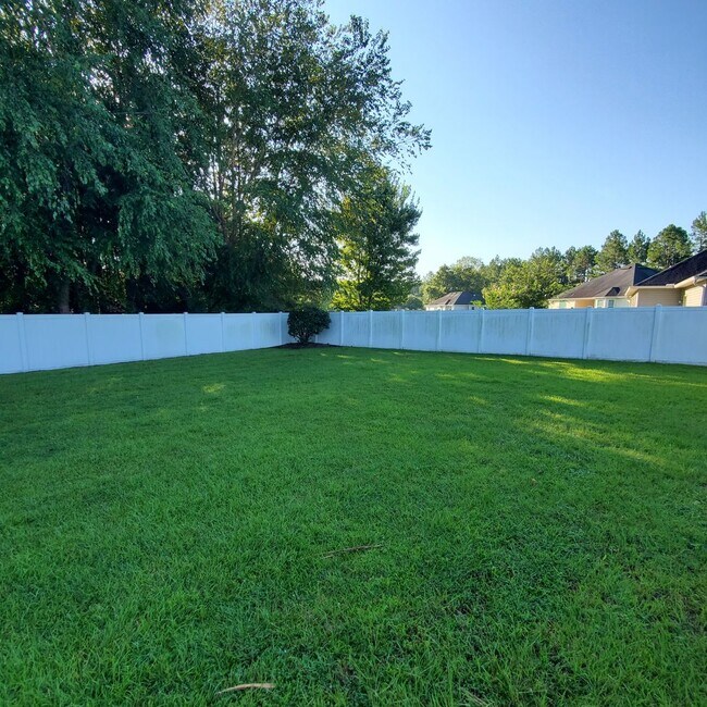 Building Photo - Welcome to Serene Living: Spacious Home on a .61 Acre Lot near Moody Airforce Base