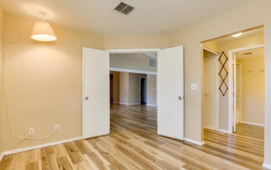 Primary Bedroom toward livingroom - 8140 N 107th Ave