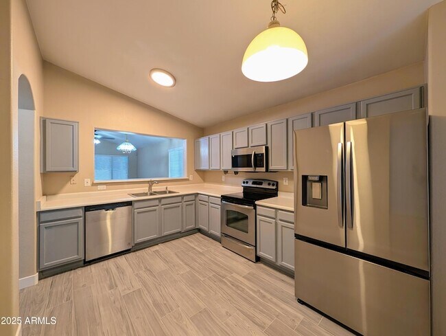 Building Photo - 7059 W Gardenia Ave