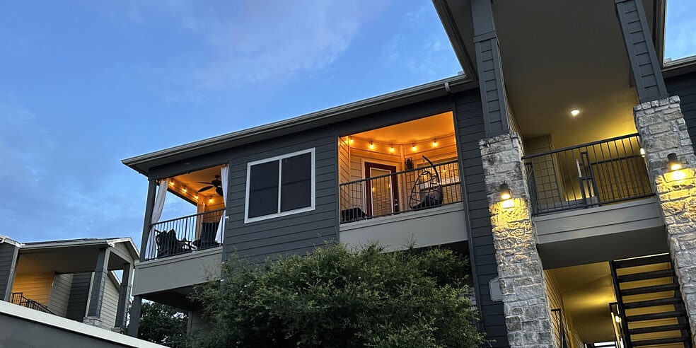 The balconies seen from below at dusk - 2320 Gracy Farms Ln