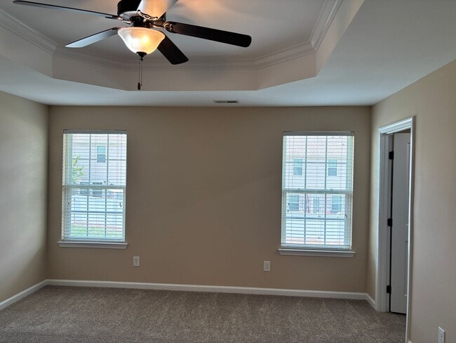 Building Photo - Beautiful End Unit Townhome in the McCarle...