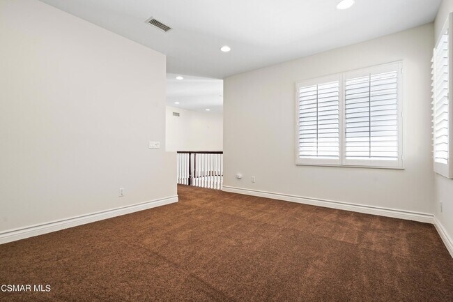Building Photo - 6077 Mandeville Pl