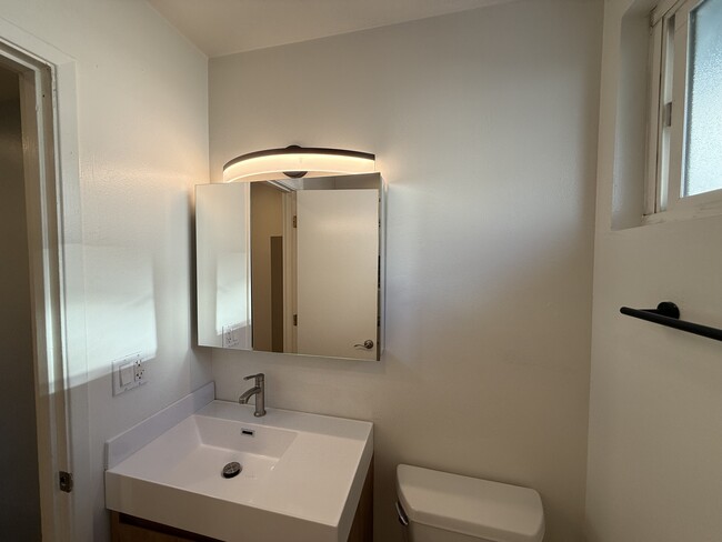 new vanity, light and mirror - 664 4th St