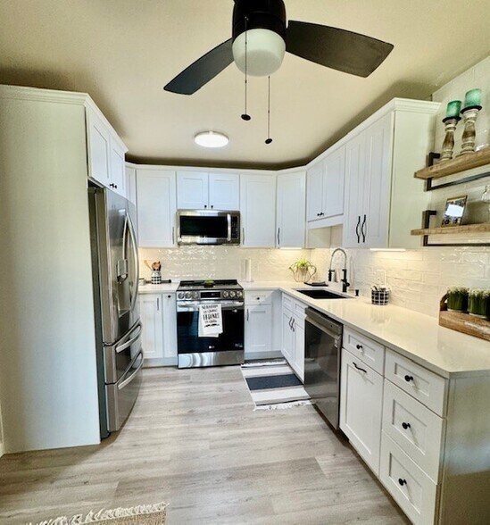 Building Photo - 9380 E Center Ave