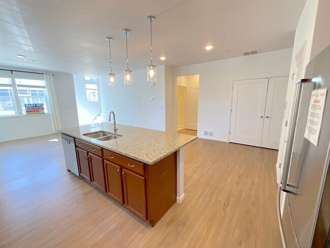 Building Photo - 3 Bedroom Townhome Available Near Voyager Pkwy & Interquest Pkwy!