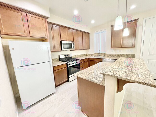 Building Photo - Comfort Meets Convenience in This Beautiful Two-Story Condo with Spacious Living Areas