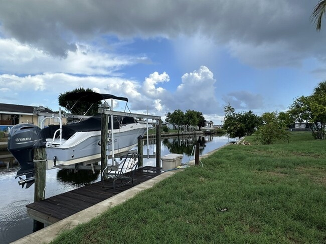 Building Photo - "Elegant 3-Bed Waterfront pool Home"