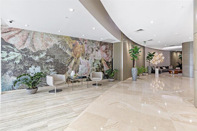 Building Photo - 10275 Collins Ave