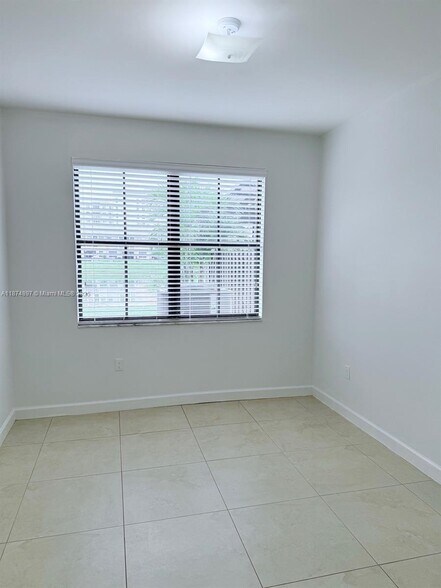 Building Photo - 5980 NW 104th Ct