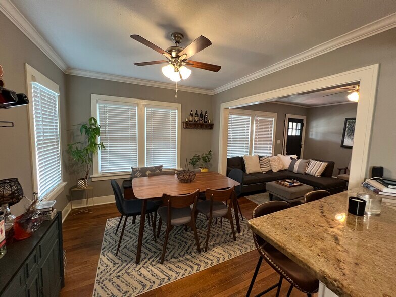 Dining room, living room and kitchen with open floor plan. - 14809 Leonard Ave