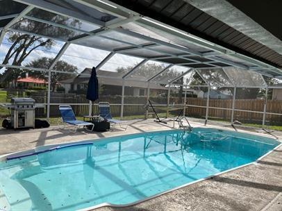 Building Photo - Pool Home in San Carlos Park | 3BR + 2BA | Screened Lanai | $2,895/mo