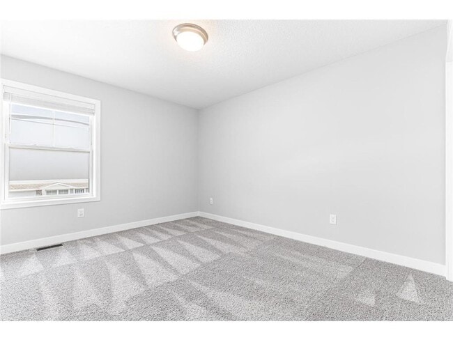 Building Photo - Spacious 3BR Townhome with Loft & Attached 2-Car Garage - Available NOW!