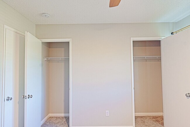 Building Photo - Spacious 3-Bedroom Attached Villa with Finished Basement & Private Fenced Yard!