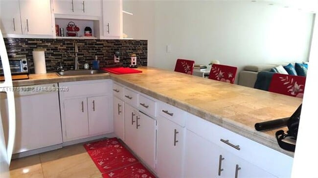 Building Photo - 5701 Collins Ave