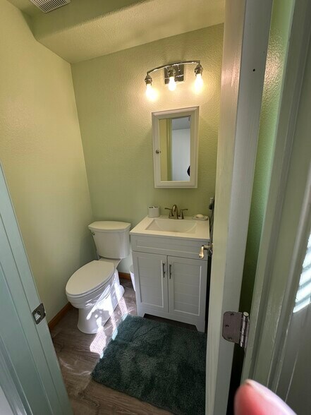 Separate toilet and washroom inside the large and spacious bathroom - 400 Main St
