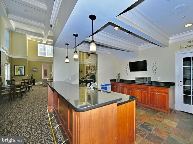 Building Photo - This impeccable 2-bedroom, 2-full bathroom condo is located in the sought-after, super-convenient...