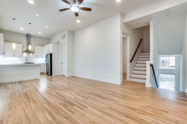 Building Photo - Beautiful townhome featuring granite countertops, hard wood floors, and a small private yard grea...