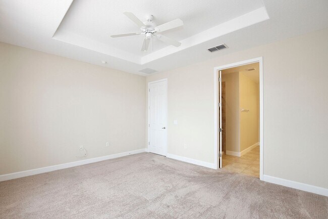 Building Photo - Stylish and Spacious 3/2.5 Townhome with Premium Features and Community Pools