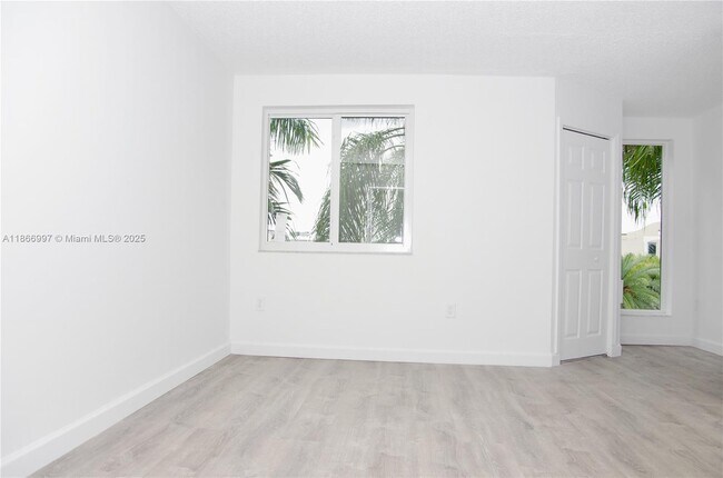 Building Photo - 8660 NW 6th Ln