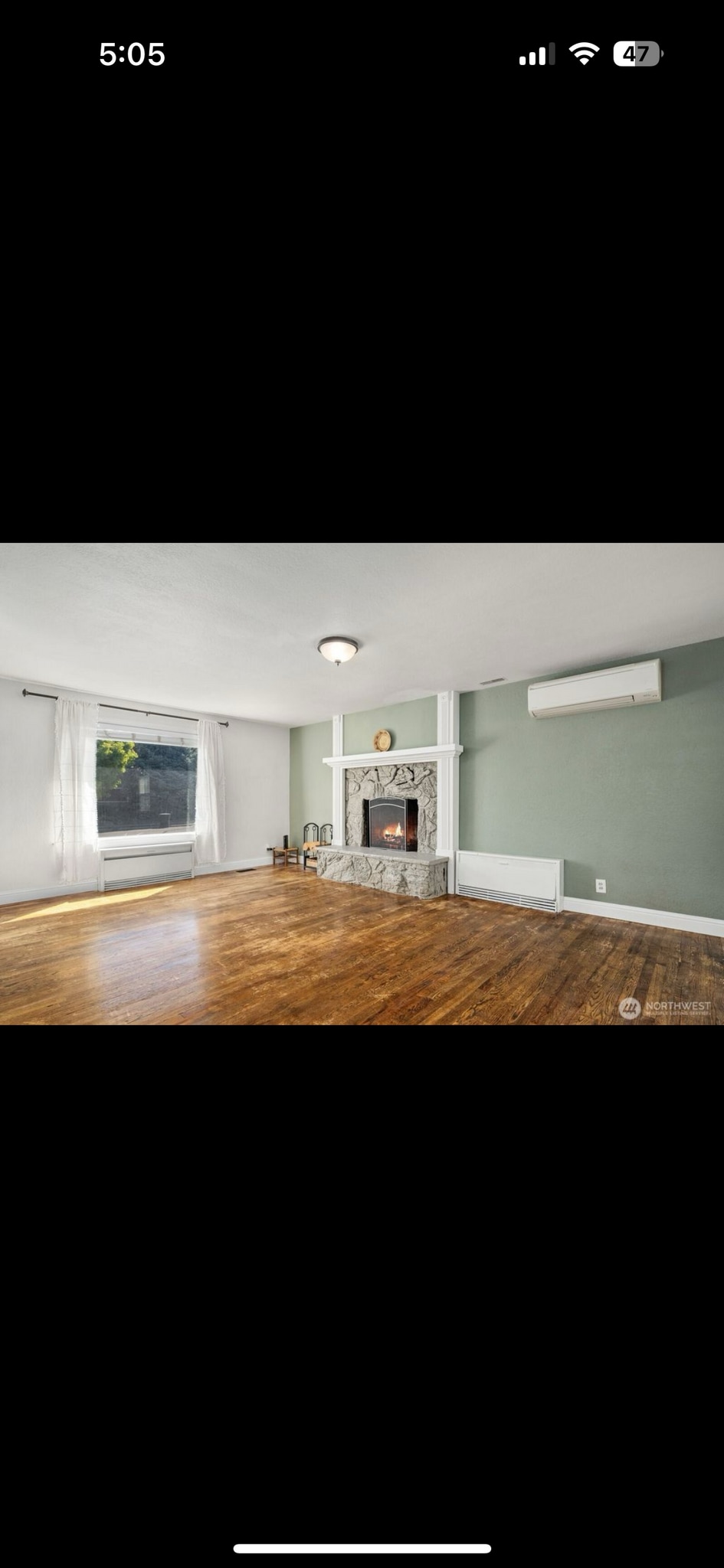 Living room with fireplace and updated heating and cooling - 520 S Wilbur Ave