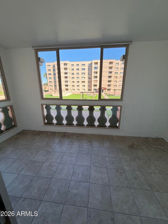 Building Photo - 7950 E Camelback Rd