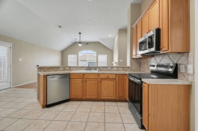 Building Photo - Welcome home to this spacious 3-bedroom, 2-bathroom property offering 2,000 square feet of comfor...