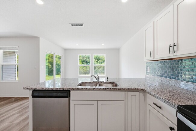 Building Photo - New community! Three bedrooms, two bathrooms and ready for you to move into!