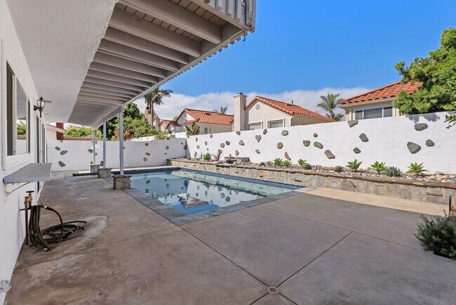 Building Photo - Coastal Elegance Meets Family Comfort in D...