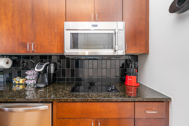 Electric range, convection/microwave oven combo (note: the oven is small, not full size) - 525 E 6th Street