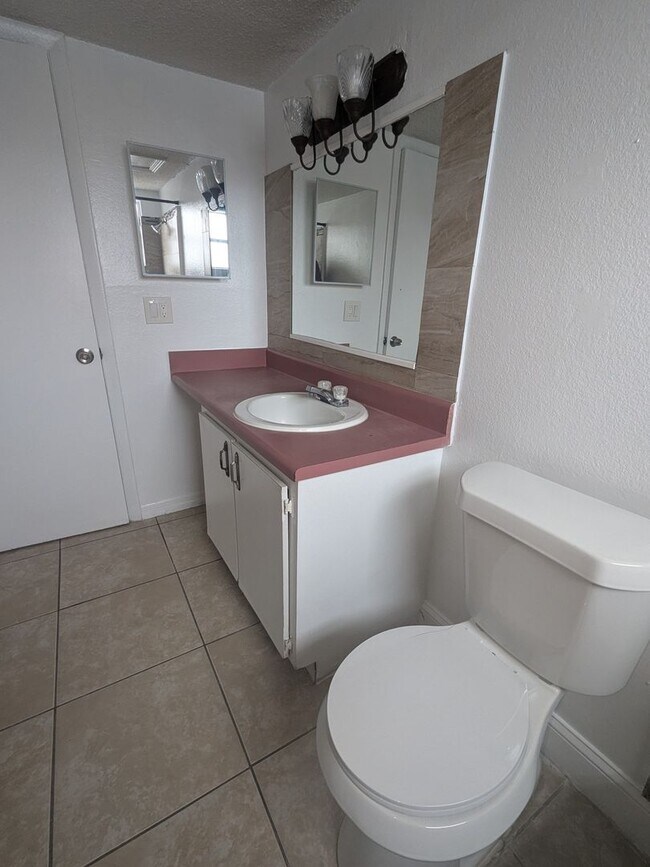 Building Photo - Palm Gardens - First Floor