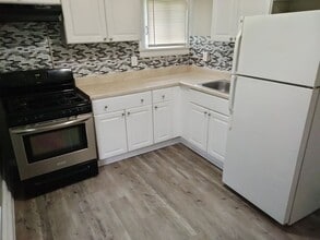 Building Photo - 391-393 Flower City Park