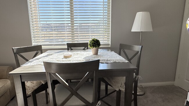 dinning table with chairs - 32914 Guinness Way