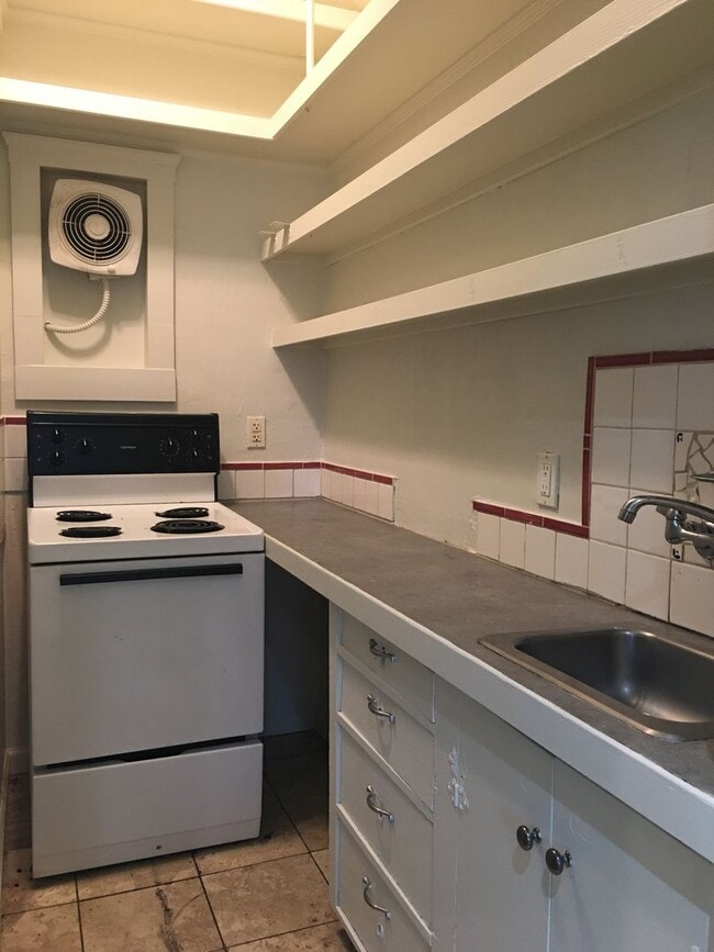 Building Photo - Affordable studio, available now!