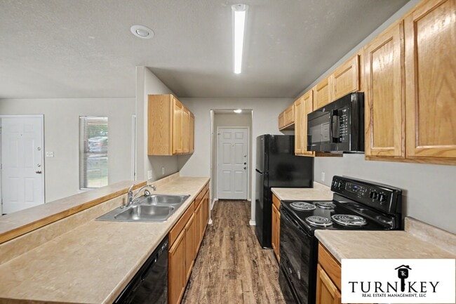 Building Photo - 8028-8030 Tanner Ave