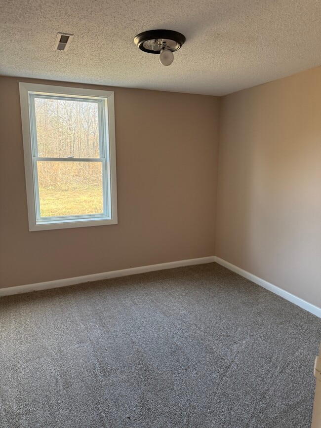 Building Photo - 402 Friendly Pooch Ln