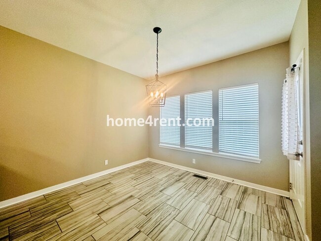 Building Photo - Ranch Style Home w/ Updated Kitchen, including SS Appliances and Granite Counters Plus a Large Un...