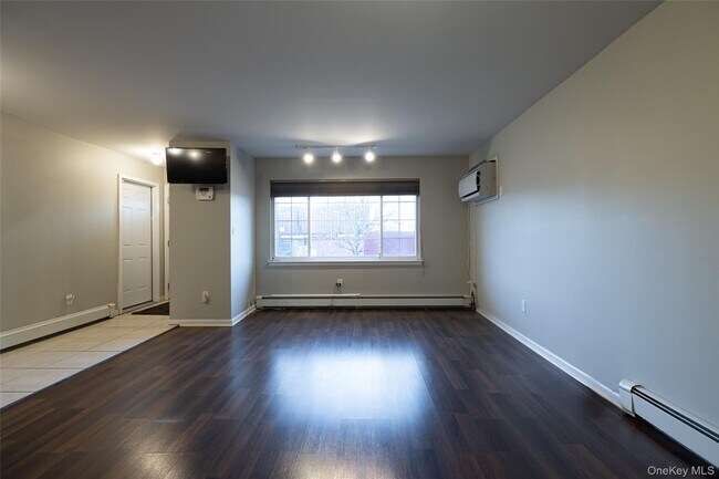 Building Photo - 62-21 Almeda Ave