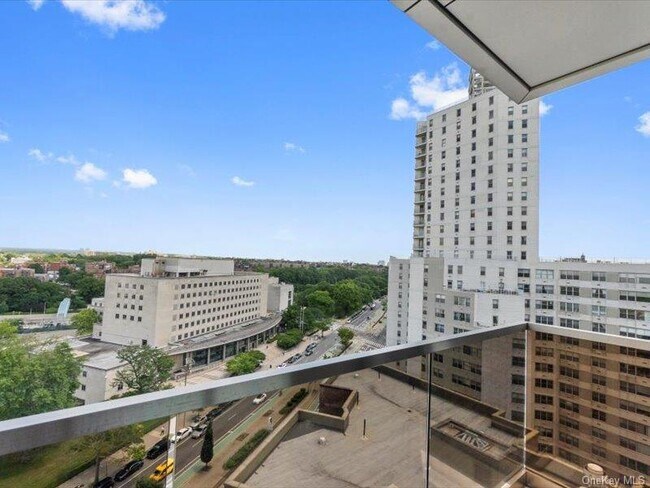 Building Photo - 124-28 Queens Blvd