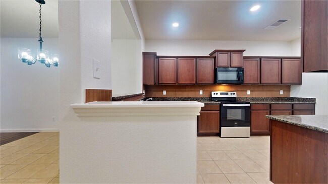 Building Photo - 9419 Grand Spark Dr