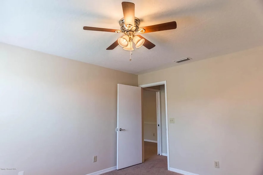 Building Photo - 7667 N Wickham Rd