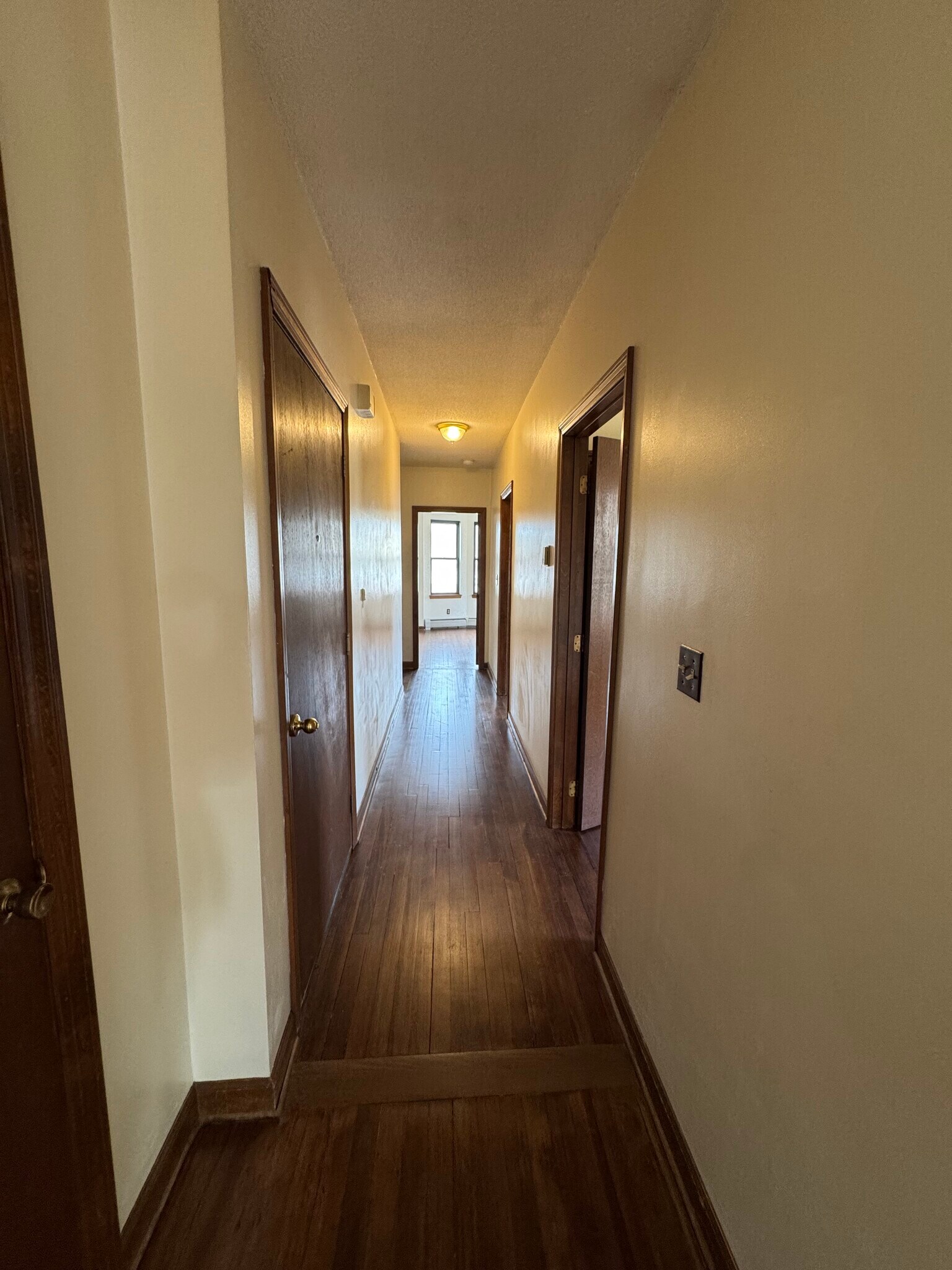 Hallway to bedrooms - 67 E Main St