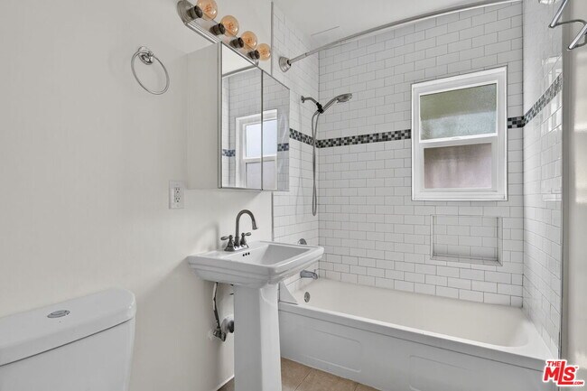 Building Photo - 13553 Moorpark St