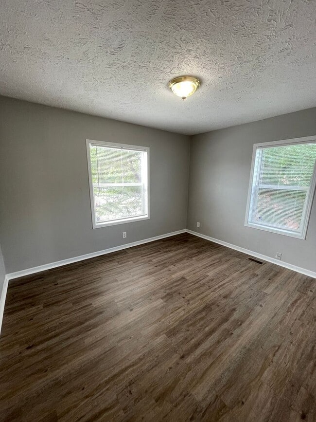 Building Photo - For Rent - Four-Bedroom Two-Bathroom Home ...