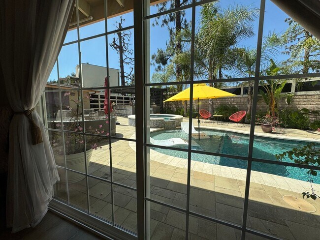 Building Photo - Luxurious Oasis with Resort-Style Pool and...