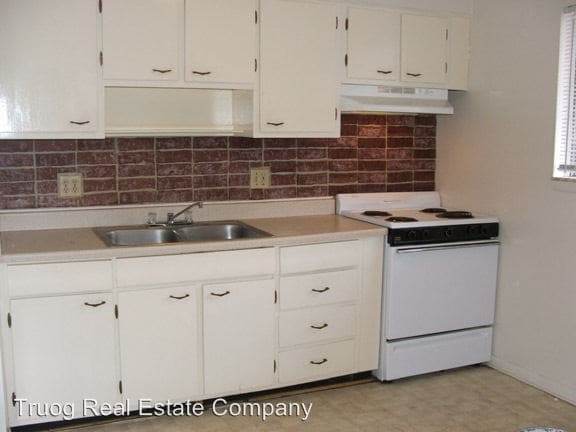 Building Photo - 1132 W 41st Ter